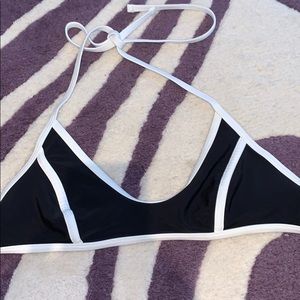 Black bikini top with white detail lines
